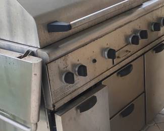 Nice Gas grill reatively clean inside. Nothing a presure washer coud not shine. $300
