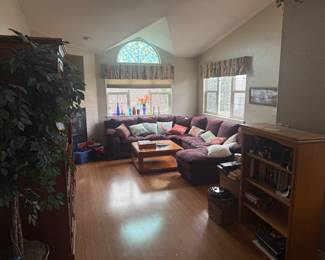 Furniture & Home Furnishings 🏡 Comfortable sectional sofa, coffee table, bookcases, home décor, decorative glass and more furnishings throughout the home.