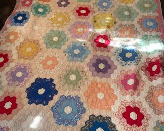Hand stitched flower garden quilt