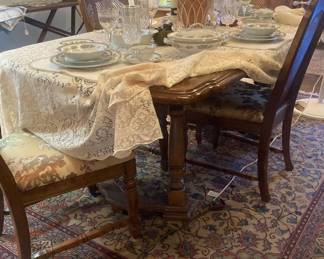 Trestle table with four chairs and leaf