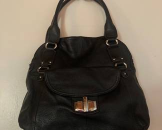B. Makowsky handbag with dust cover
