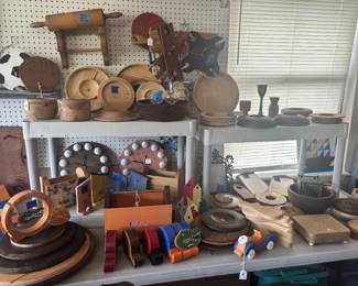 Hand turned wooden item. Sports, candle holders, rolling pin with holder and spoon holders etc.  