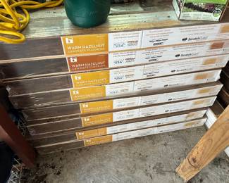 Boxes of Laminate flooring - looks and sounds like genuine wood