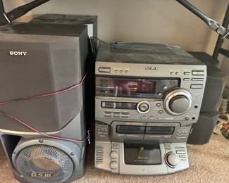 a Sony LBT-W900AV Compact Hi-Fi Stereo System, which was a popular "tower of power" multi-component-style shelf system manufactured by Sony around the late 1990s and early 2000s. The main unit (model HCD-W900AV) is paired with original Sony D.S.W. (Digital Sub Woofer) speaker cabinets. It features a 5-disc rotary CD changer, dual auto-reverse cassette decks, an AM/FM tuner, and massive output power common to this era's "party" stereos.