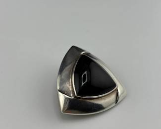 sterling silver and onyx statement piece, used as a pendant on necklace