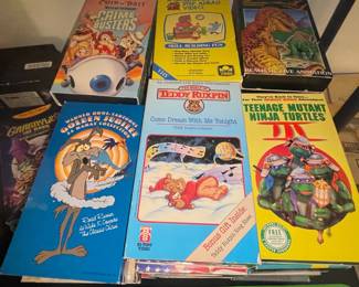 Collection of Vintage Children's VHS Tapes featuring Disney and TMNT