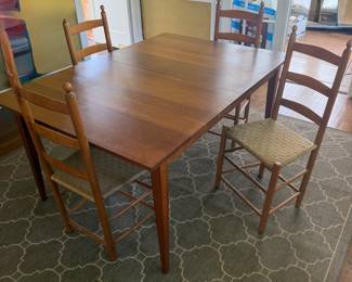 Asher Benjamin & Co cherry table with 2 leaves and  Shaker chairs 
