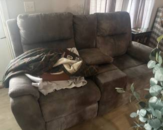 . . . grey upholstered love seat