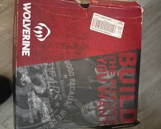 . . . (same boots, box closed)