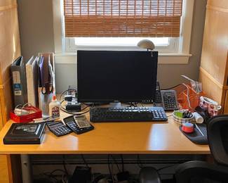 Desk, monitor keyboard, and tons of home office electronics