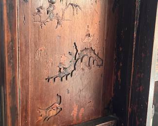 Carving on the interior of the table