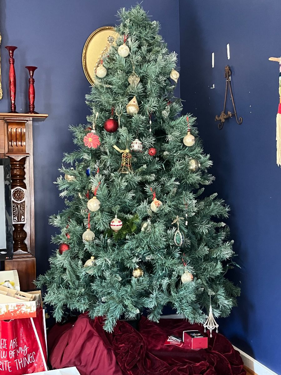 6 ft Christmas tree and many Victorian- inspired ornaments