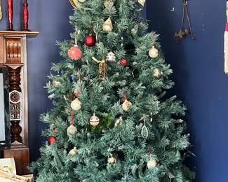 6 ft Christmas tree and many Victorian- inspired ornaments