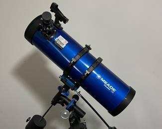 Meade Polaris 130 telescope, tripod, and accessories.