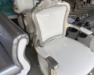 white patent leather and silver chairs
