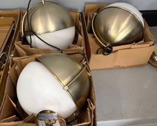 gold and white sphere pendant lamps