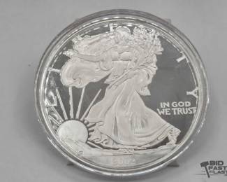 2004  2002 Walking Liberty 5oz Round