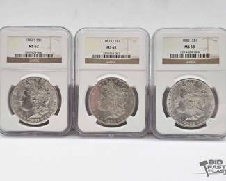 2542  3 1882 Morgan Silver Dollars