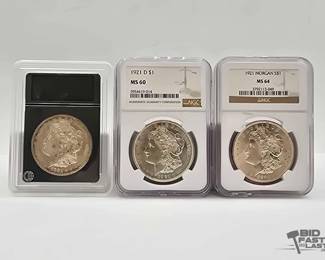 2574  3 1921 Morgan Silver Dollars