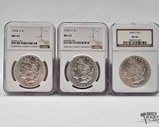 2570  3 1904 Morgan Silver Dollars