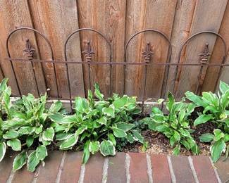 There are 5 of these garden fence sections