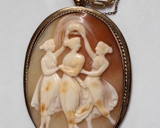 Carved shell cameo pendant with three Graces