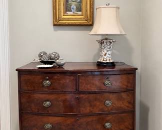 Bowfront chest. Regency flame mahogany with 5 drawers