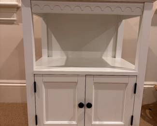 Small white cabinet with storage