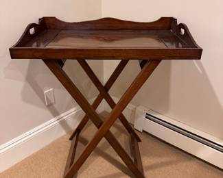 Classic butler's tray table with collapsible stand.