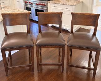 Sterling collection counter stools with leather seats and nail head trim (3 available).