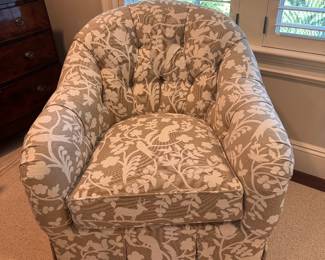 Tufted back swivel chair by Kravet
