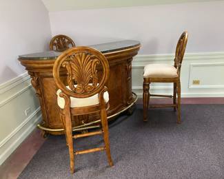 Dry bar with three stools