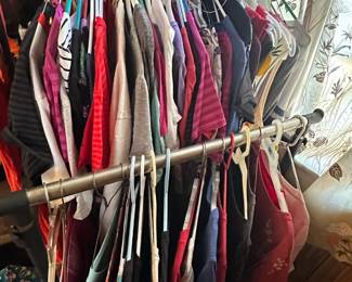 2 racks of Disney shirts in great condition