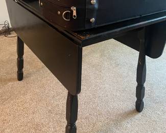 vintage black table with folding leafs
