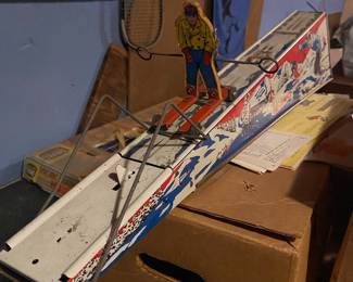 Metal downhill skier