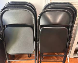 Over 40 folding metal chairs