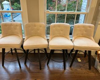 Set of 4 swivel stools in excellent condition