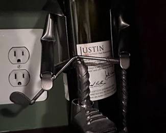 Another metal bottle holder (golfer breaking his club)