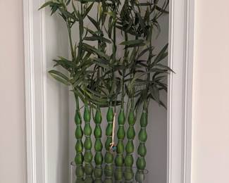 Fake plant in glass