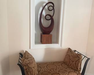Bench and abstract sculpture