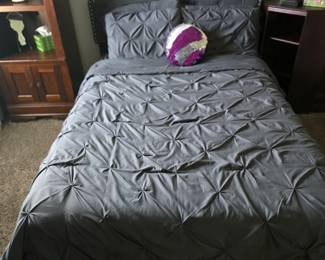 Double bed with connected underbed storage baskets