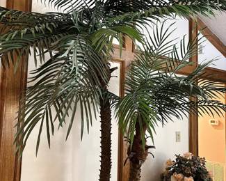 LOTS of impressive 6’ to 8’ faux palm trees and plants in decorative planters