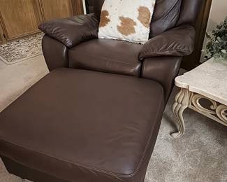 Pair of Natuzzi Italsofa leather recliners and ottoman