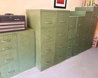 Garage packed floor to ceiling—sporting goods, file cabinets, power and hand tools, tool cabinets and hardware and much more!