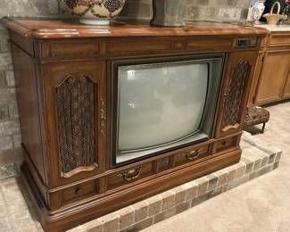 Vintage Zenith television with console cabinet and side speakers, non-working condition