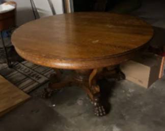 Antique round dining table