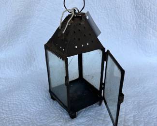Antique tin and glass lantern