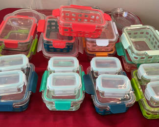 Lot 59: Assorted glass and plastic food storage containers with colorful lids
