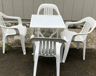 Lot 124: Four Patio Chairs and Table