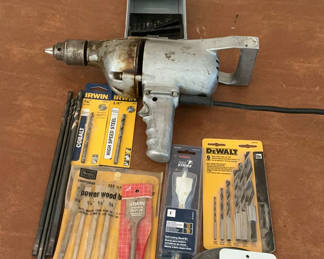 Lot 43: Vintage corded electric drill with assorted drill bits and accessories
